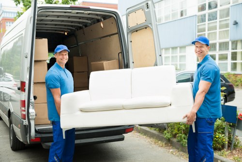 Office relocation planning in Merton with moving boxes and workplace setup