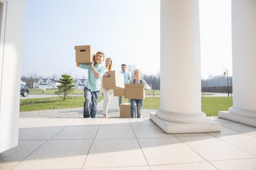 Removal company staff reviewing a customer complaint form
