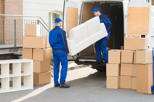 Professional movers handling apartment relocation in Merton