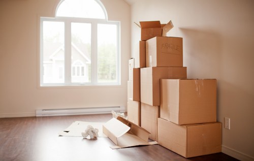 Worker wearing protective equipment during furniture relocation