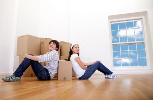 A local packing team preparing boxes for a move in Merton
