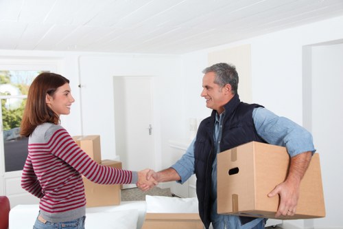 Family preparing belongings for a house move in Merton