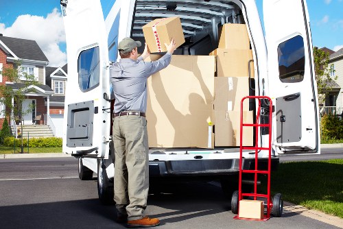 Packed boxes and household items ready for urgent removals