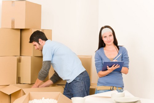 Trained removals staff using protective equipment