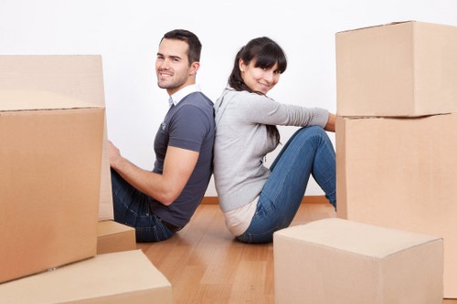Professional Merton movers packing boxes and furniture